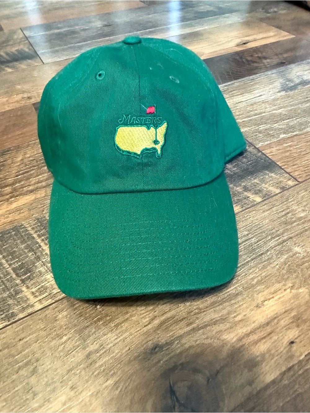 Masters Green Hat with Yellow USA Logo and Red Flag Accent